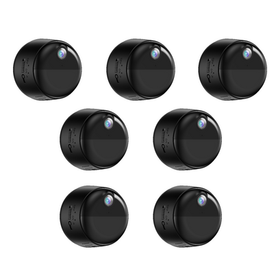 Set of seven black round mini cameras on a white background