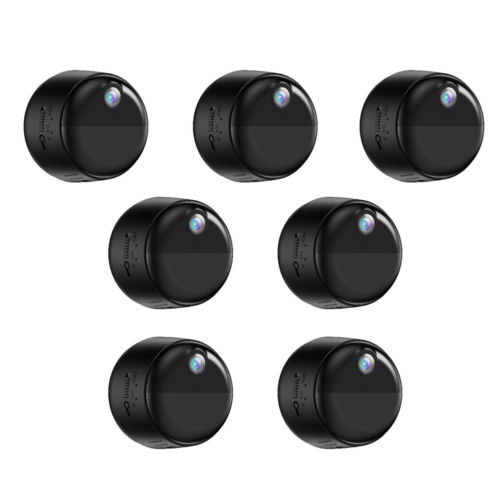 Set of seven black round mini cameras on a white background