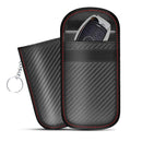 Two black carbon-fiber pattern pouches with red stitching, one holding a car key fob and keyring attached.